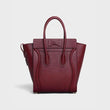 Micro Luggage Handbag In Drummed Calfskin Light Burgundy