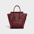 Micro Luggage Handbag In Drummed Calfskin Light Burgundy