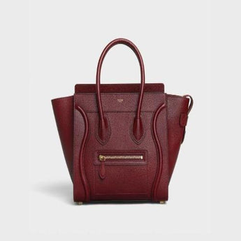 Micro Luggage Handbag In Drummed Calfskin Light Burgundy