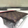 LV Pochette Tuileries Monogram Coated Canvas Red